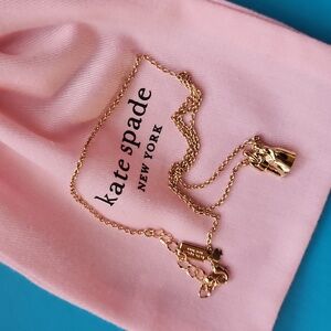 Kate Spade Bride & Groom Cake Topper Necklace.